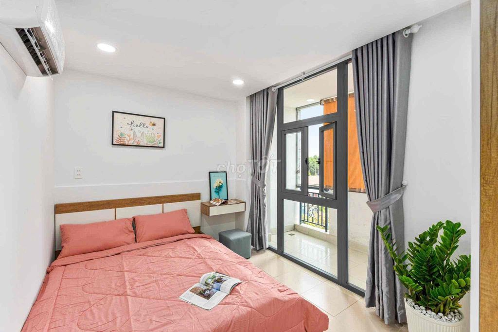 Super. A balcony bedroom right near the University of Base Three.