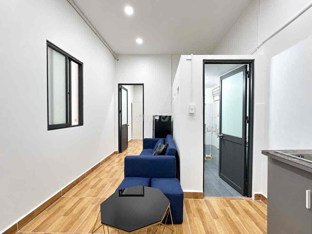 Two bedrooms, one living room, basic interior, sky windows right in the middle of the ice-cold college.