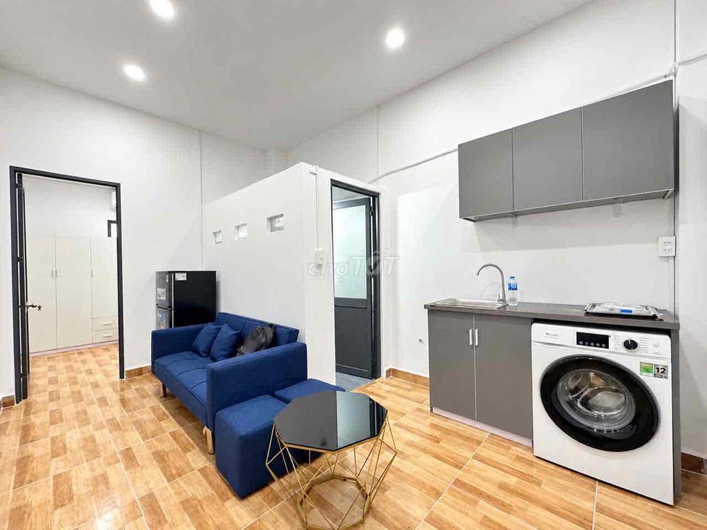 Two bedrooms, one living room, basic interior, sky windows right in the middle of the ice-cold college.