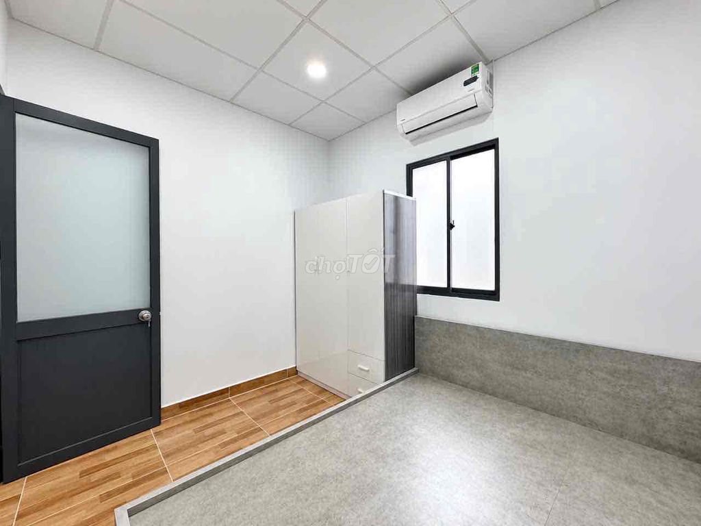 Two bedrooms, one living room, basic interior, sky windows right in the middle of the ice-cold college.