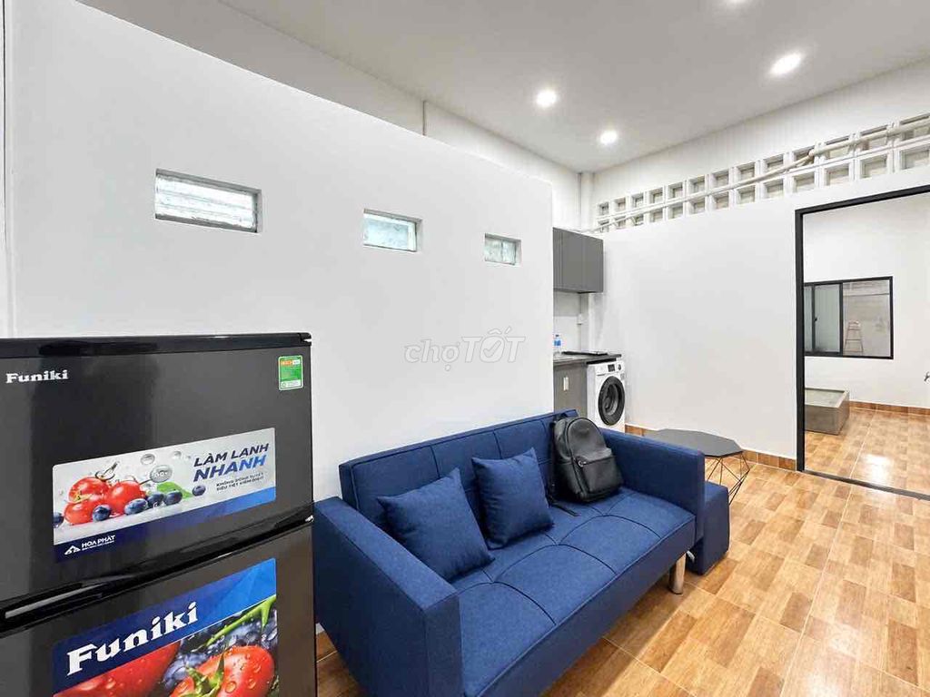 Two bedrooms, one living room, basic interior, sky windows right in the middle of the ice-cold college.