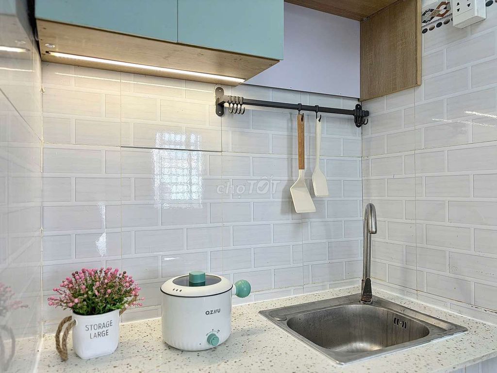 The mini apartment has a balconies with new furniture built in the shower, lotte mart.