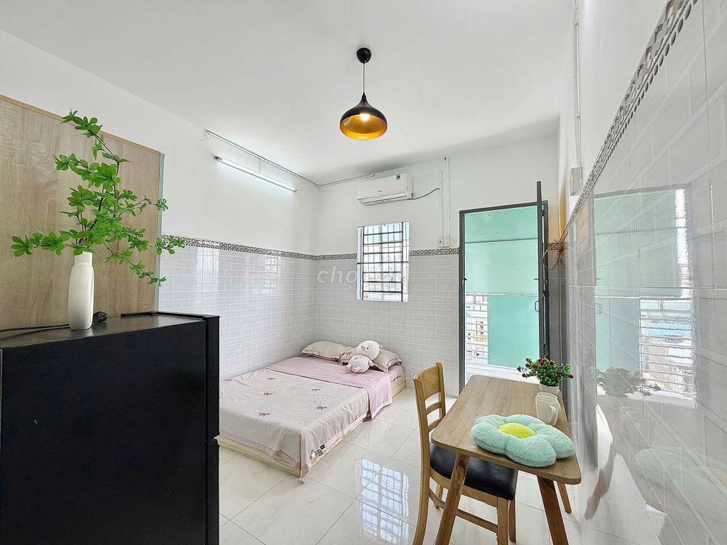 The mini apartment has a balconies with new furniture built in the shower, lotte mart.