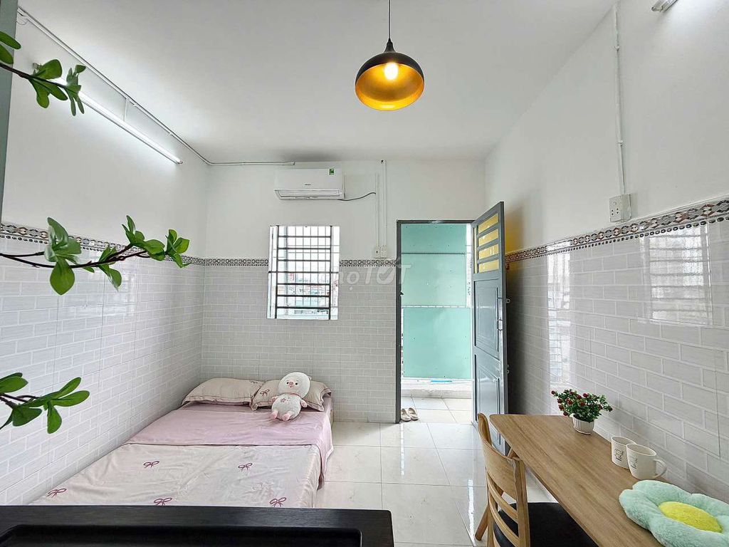 The mini apartment has a balconies with new furniture built in the shower, lotte mart.