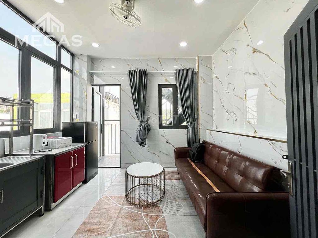 The studio of the super wide apartment - with a balcony - open sky windows