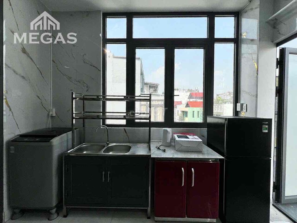 The studio of the super wide apartment - with a balcony - open sky windows