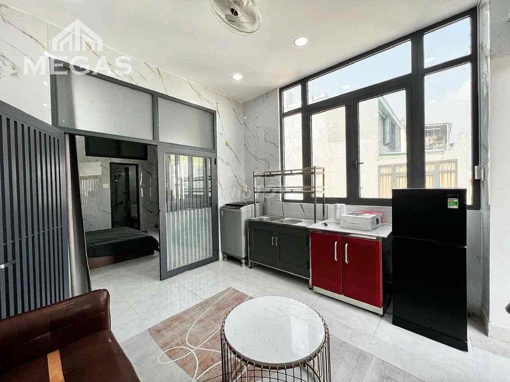 The studio of the super wide apartment - with a balcony - open sky windows