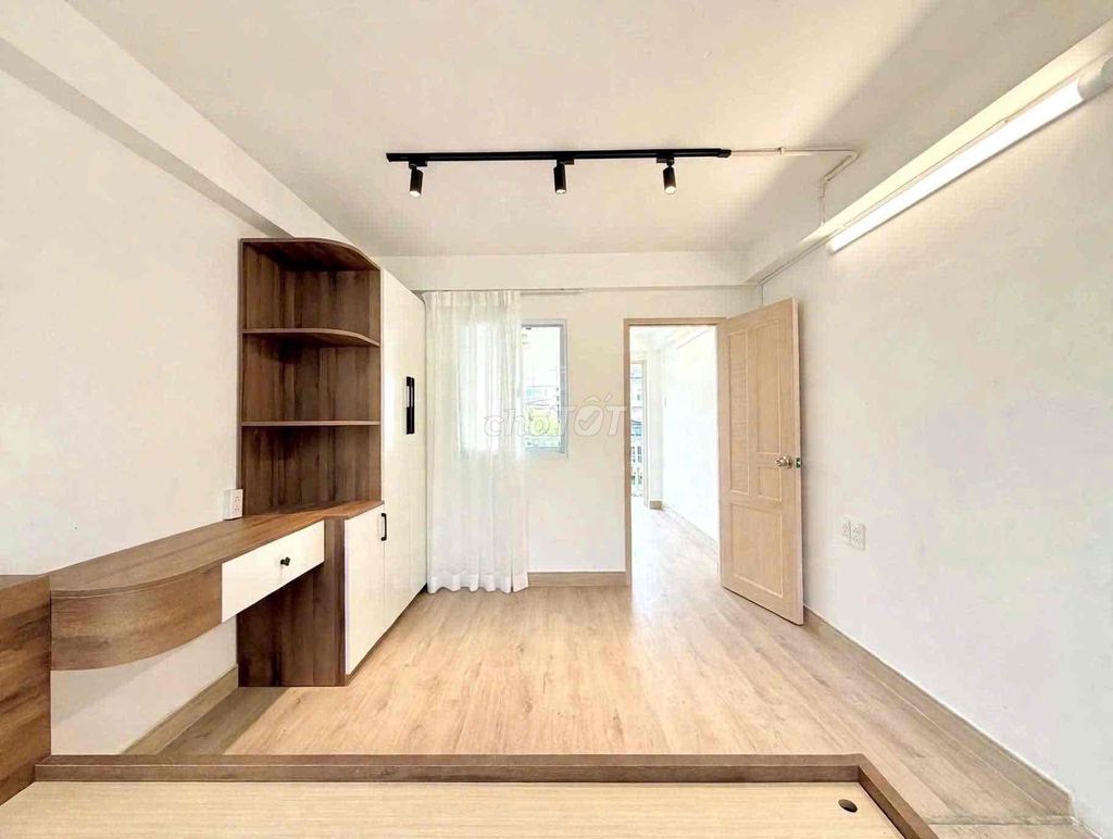 Small apartment one bedroom full of furniture.