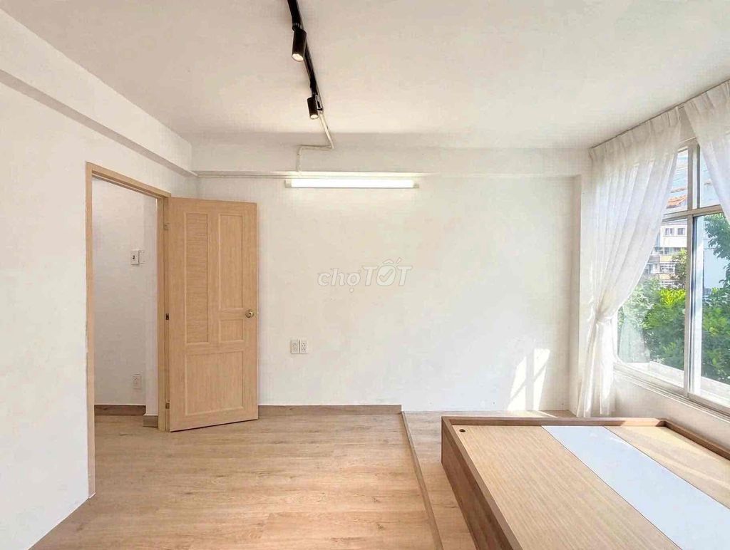 Small apartment one bedroom full of furniture.