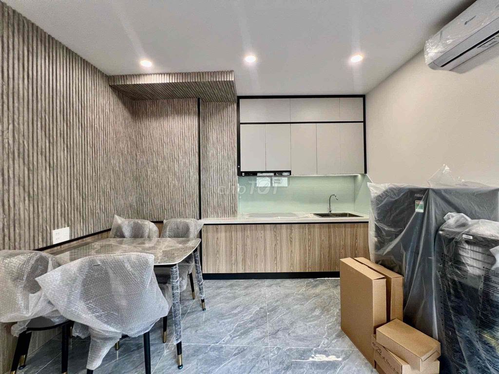 Rent two bedrooms 50 Phạm Văn Đồng near the airport.