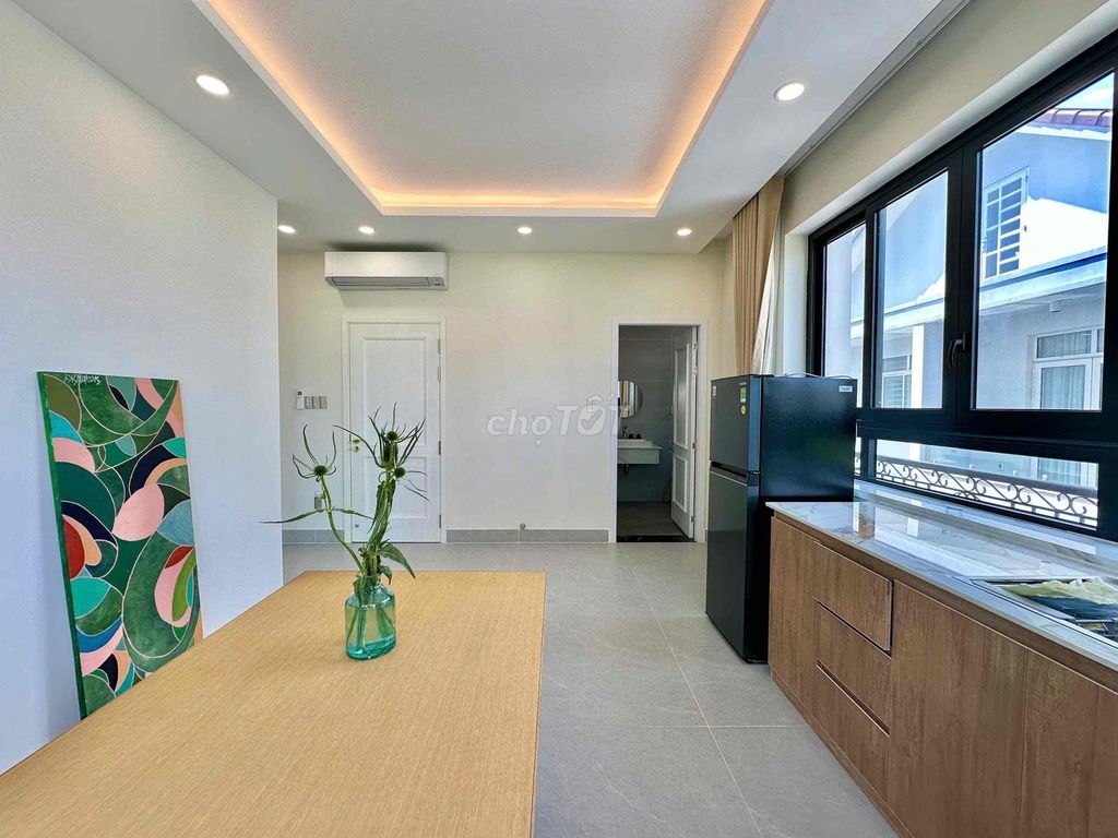 The apartment. A big balconies. A big Trương Văn Bang.