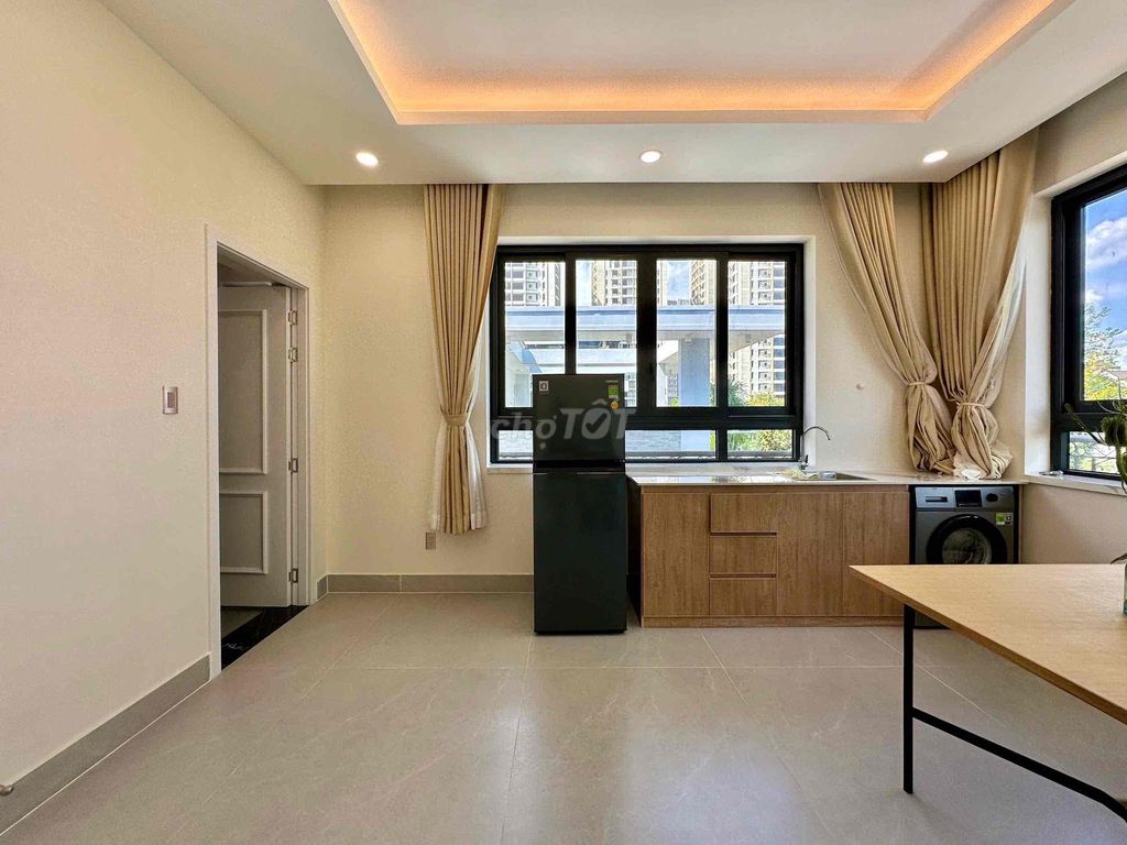 The apartment. A big balconies. A big Trương Văn Bang.