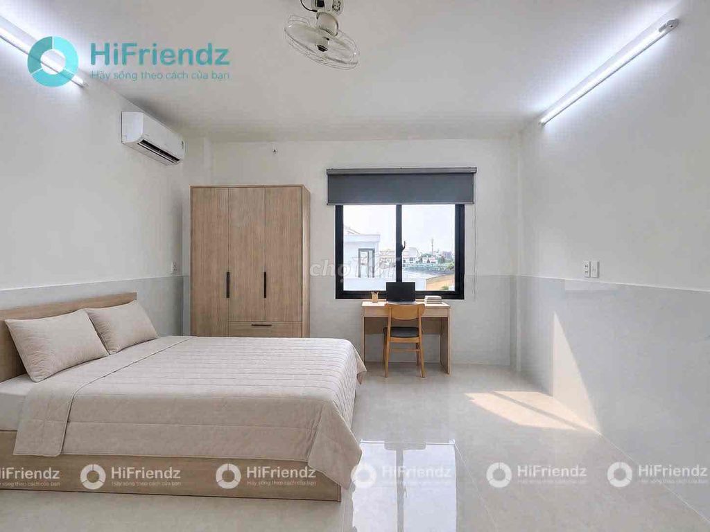 The studio apartment is full of furniture near the north coastal residence.