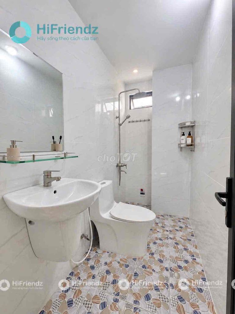 The studio apartment is full of furniture near the north coastal residence.