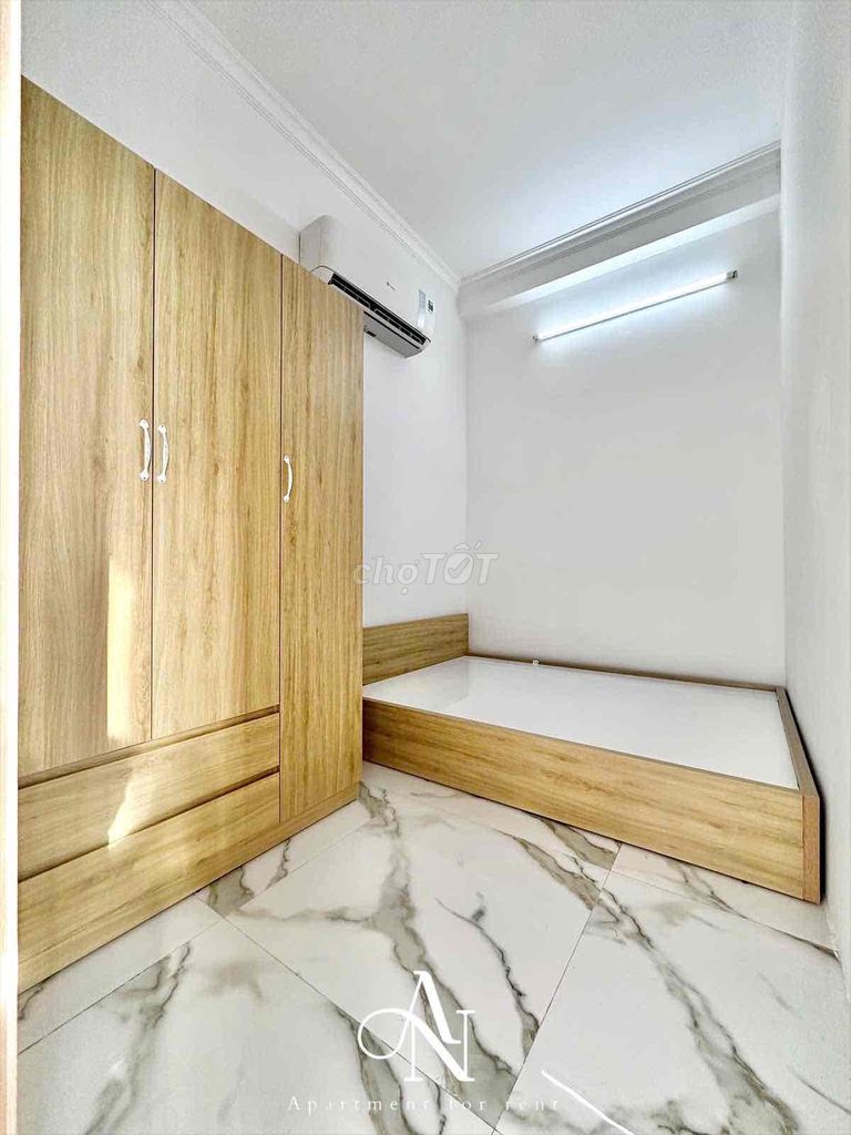 The two bedrooms are 90 percent new-- new furniture-- balcon's open-- ENCOM 25 Bình Thạnh