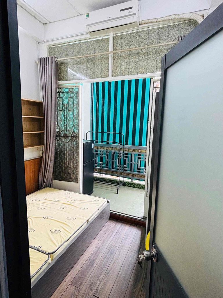 Two balcony bedrooms full of furniture right on Merritt Street.