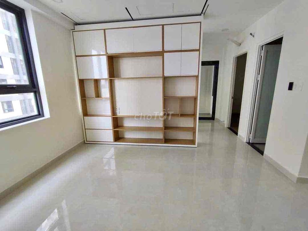 Sài Gòn Intela. Two bedrooms with bed curtains on them.