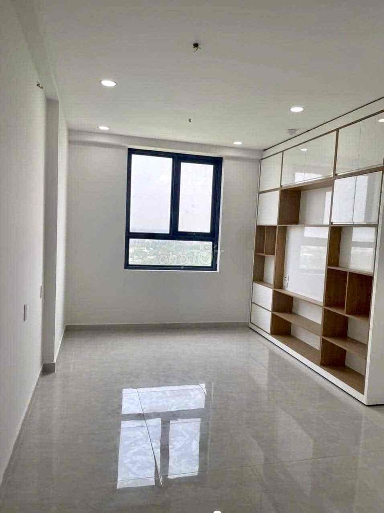 Sài Gòn Intela. Two bedrooms with bed curtains on them.