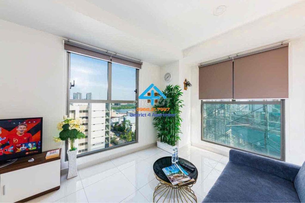 The apartment. A bedroom view of the Saigon Royal River.