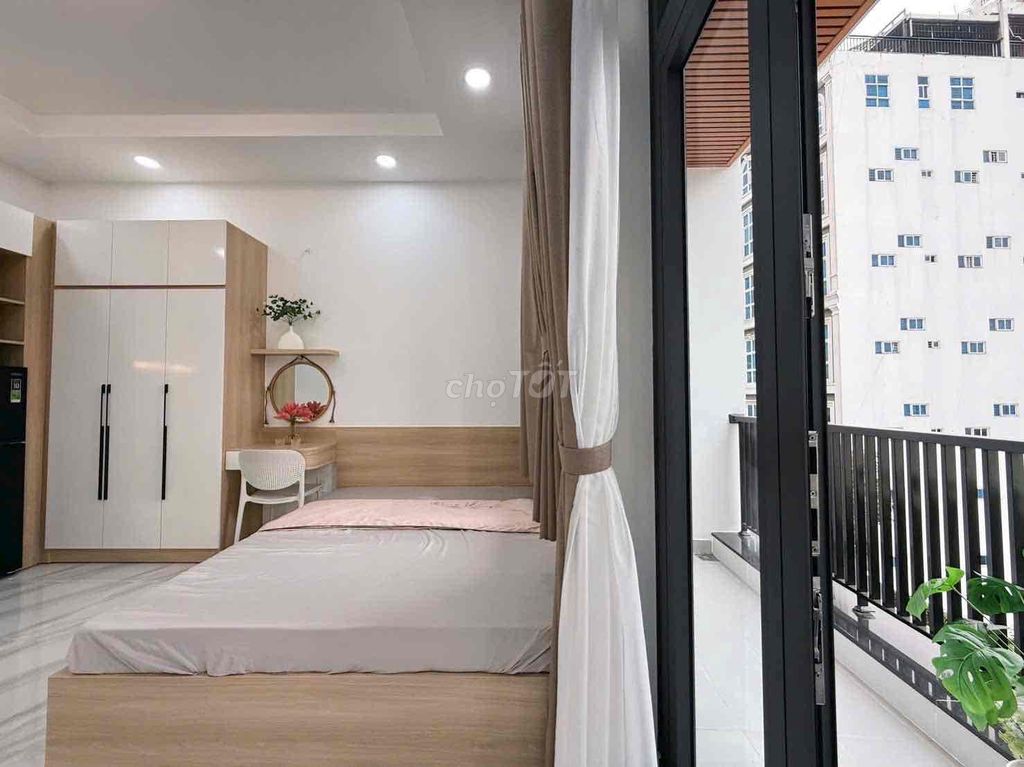 Rent a new studio, balcony, private washing machine, Lê Quang Định.