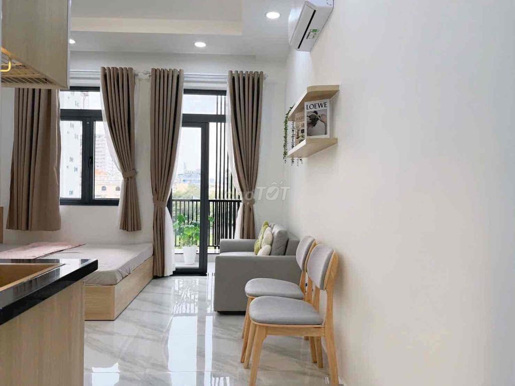 Rent a new studio, balcony, private washing machine, Lê Quang Định.