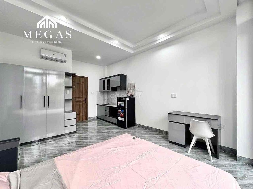 The service apartment -- 100 percent built -- balcony -- right at Lê Văn Khương.