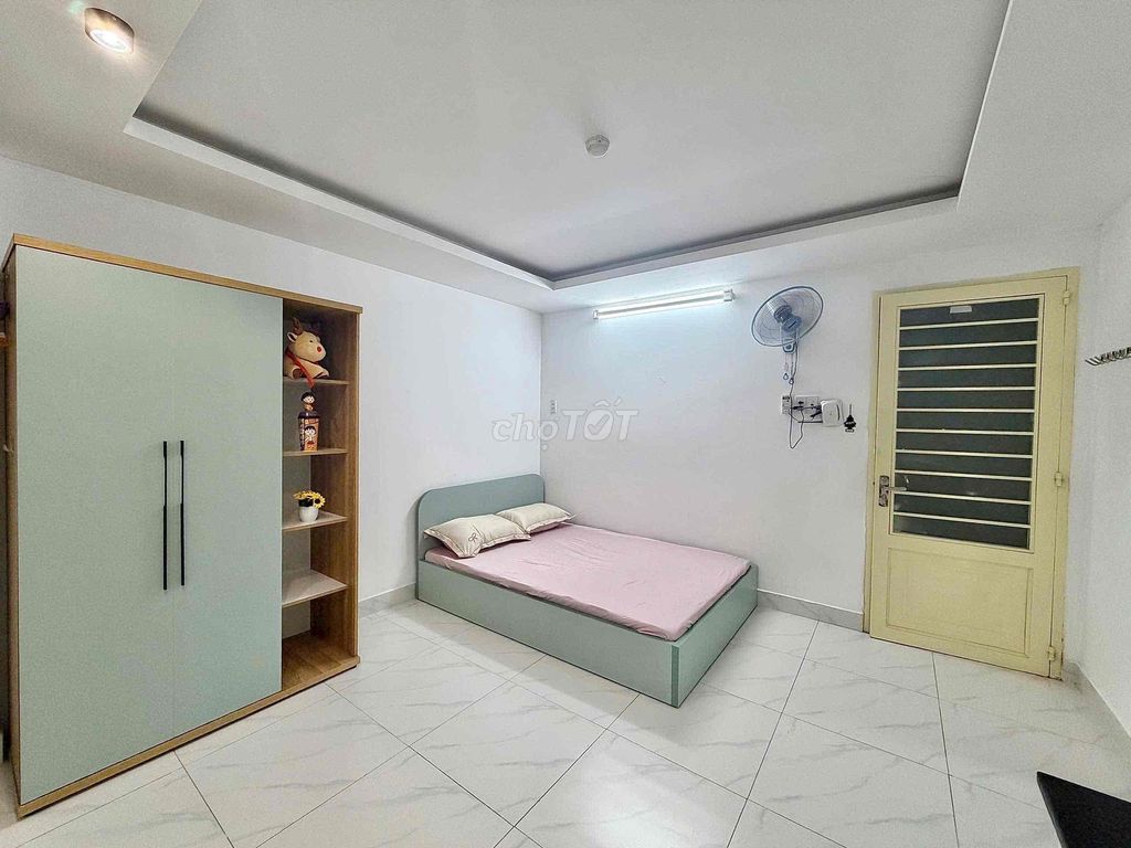The fancy mini service apartment is full of furniture right here in Tân Sơn Nhì.