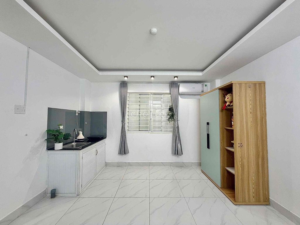 The fancy mini service apartment is full of furniture right here in Tân Sơn Nhì.