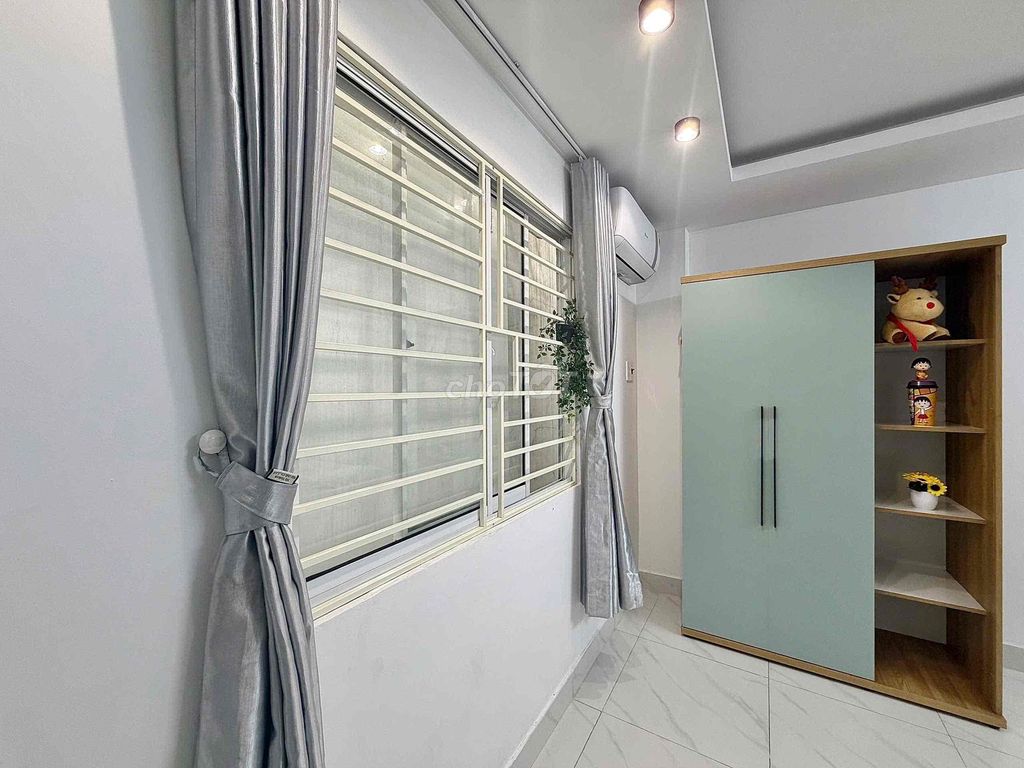 The fancy mini service apartment is full of furniture right here in Tân Sơn Nhì.