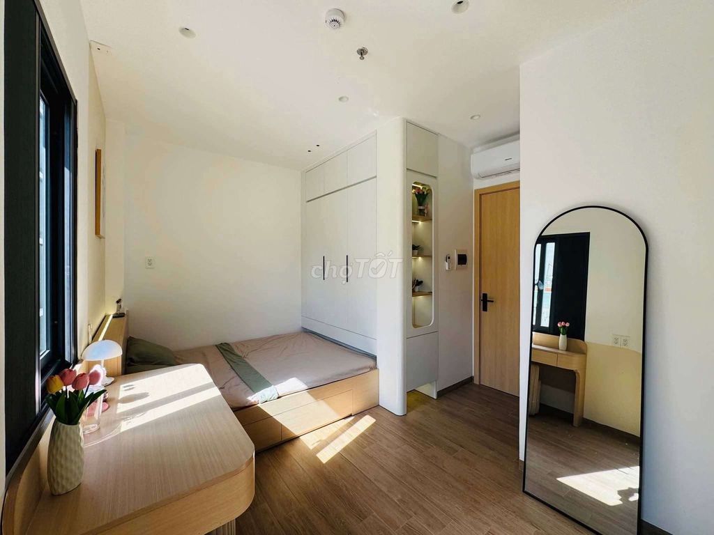 The luxurium service apartment is full of furniture right over here.