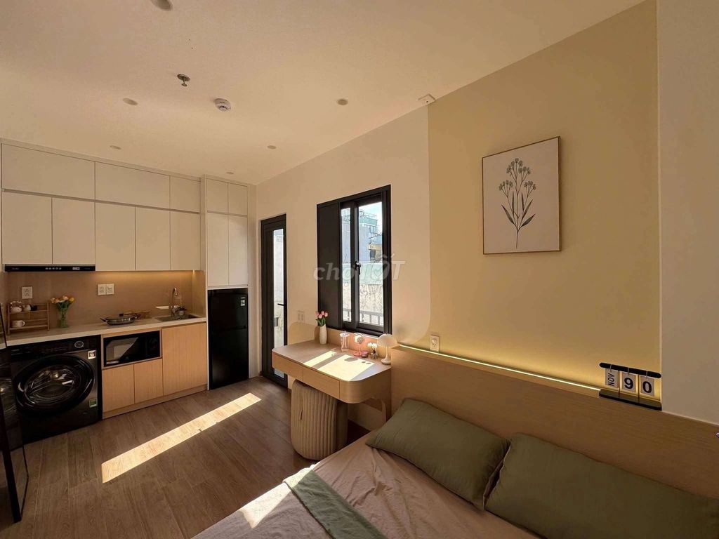 The luxurium service apartment is full of furniture right over here.