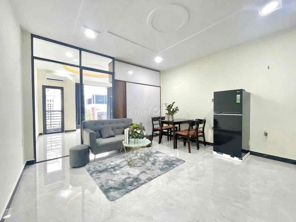 The 1st House has a large living room. Phú Nhuận balcony.
