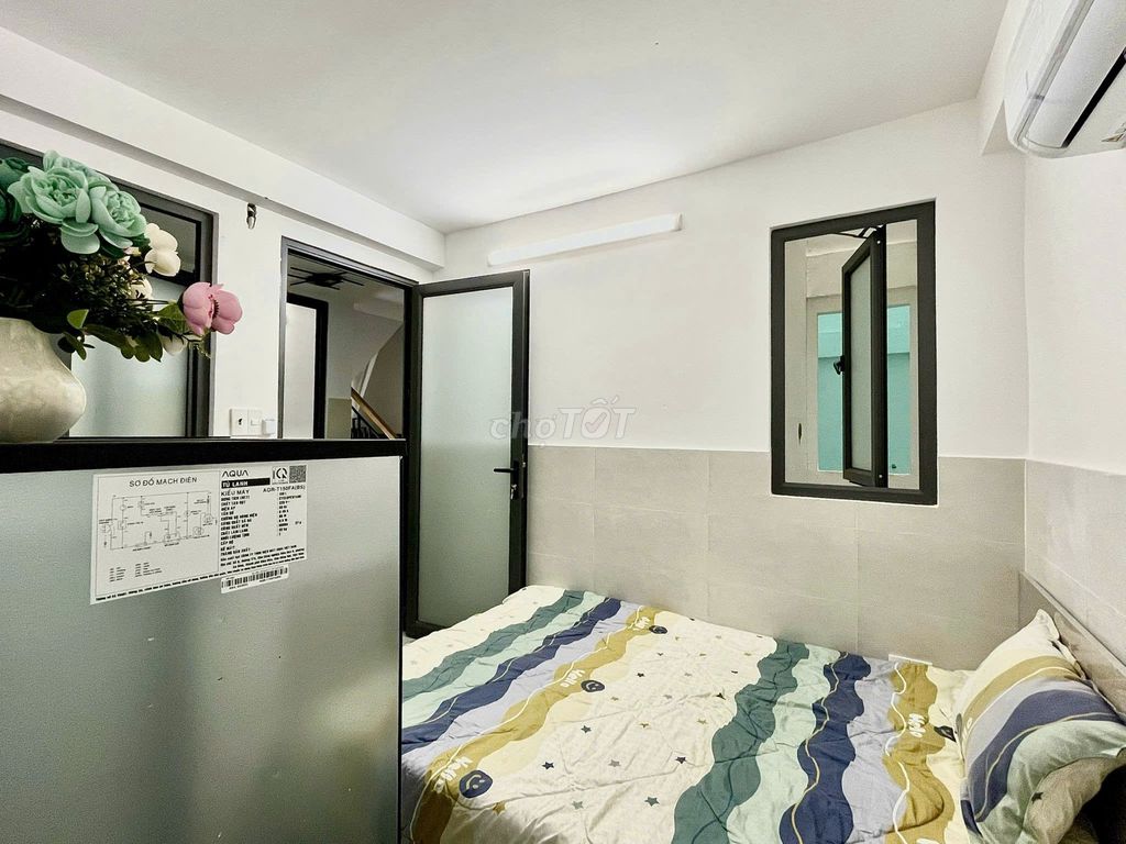The studio is full of furniture right at the treatment corner - with elevators, big garages