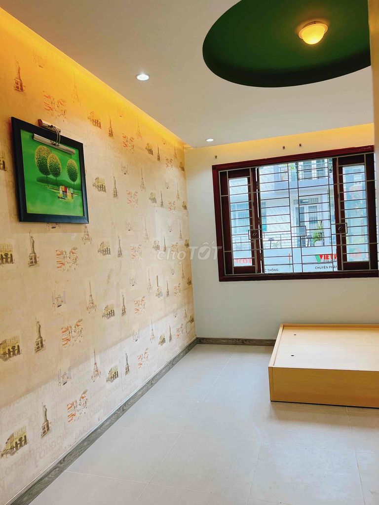 Studio. A bedroom with a balcony.