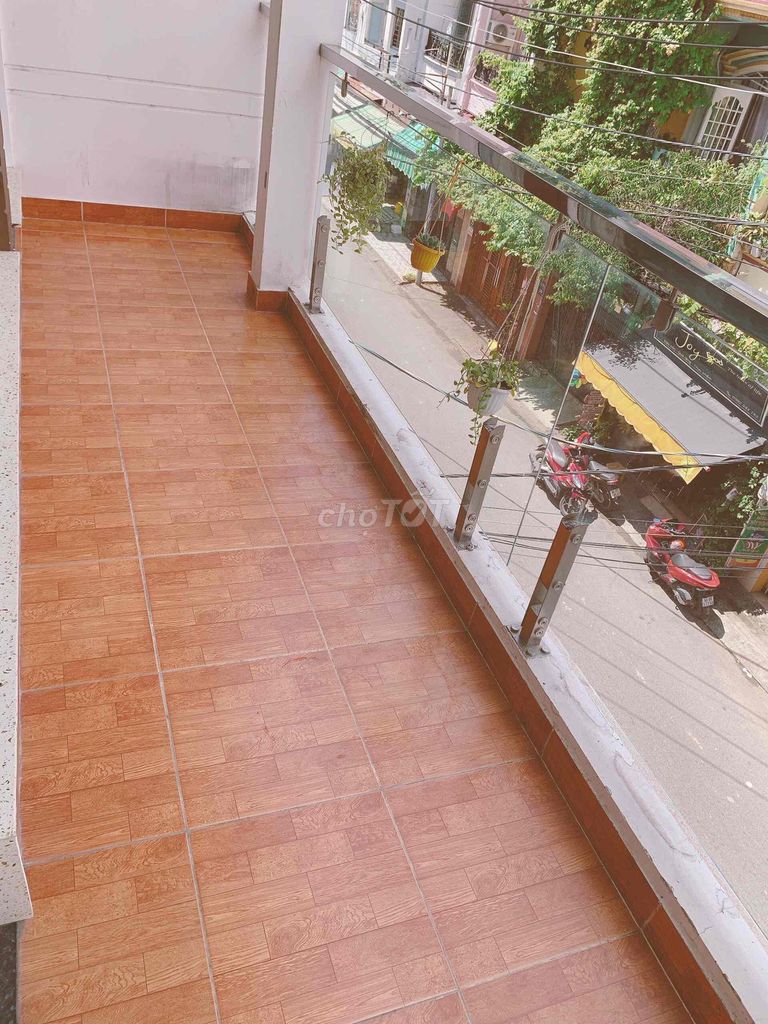 Studio. A bedroom with a balcony.