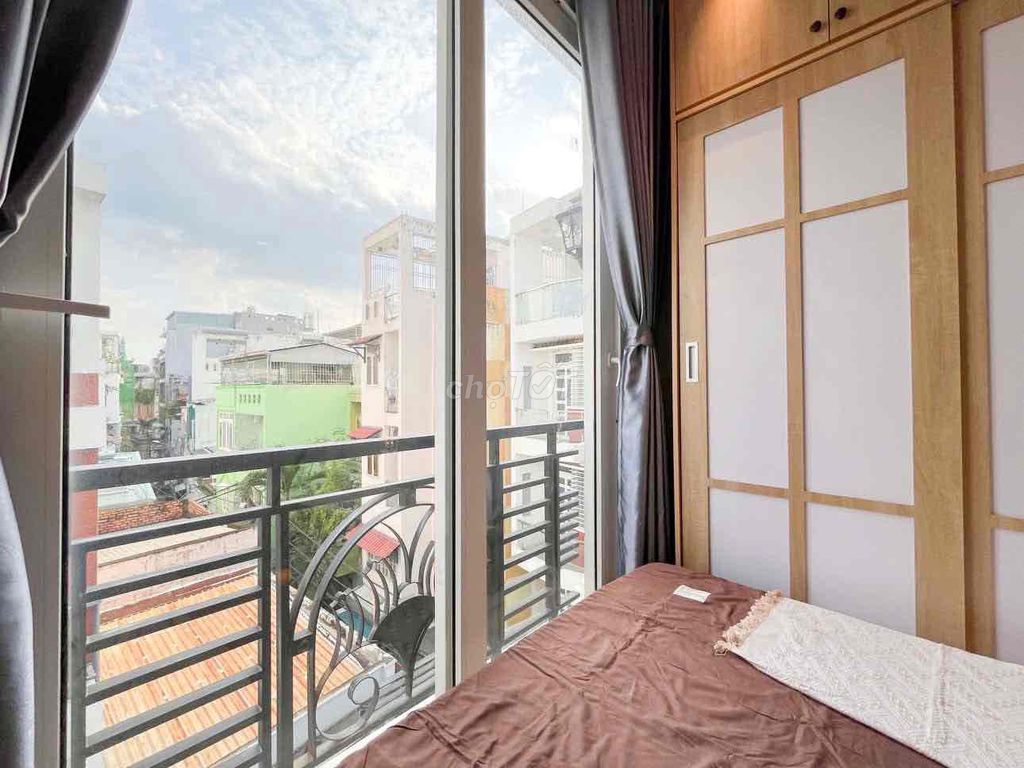 Soft-salt balcony studio