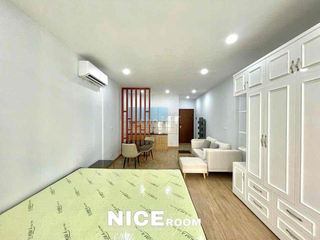The apartment is full of furniture at the staff academy.