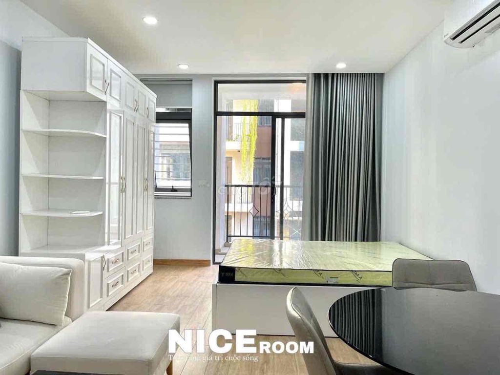 The apartment is full of furniture at the staff academy.