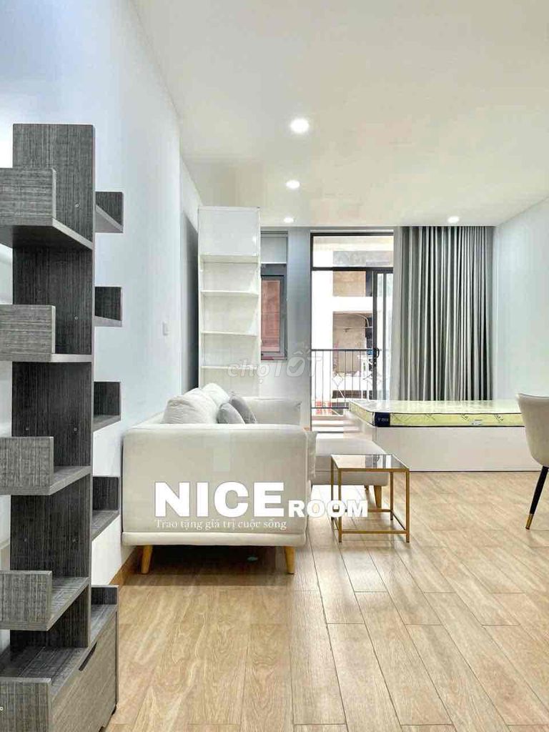 The apartment is full of furniture at the staff academy.