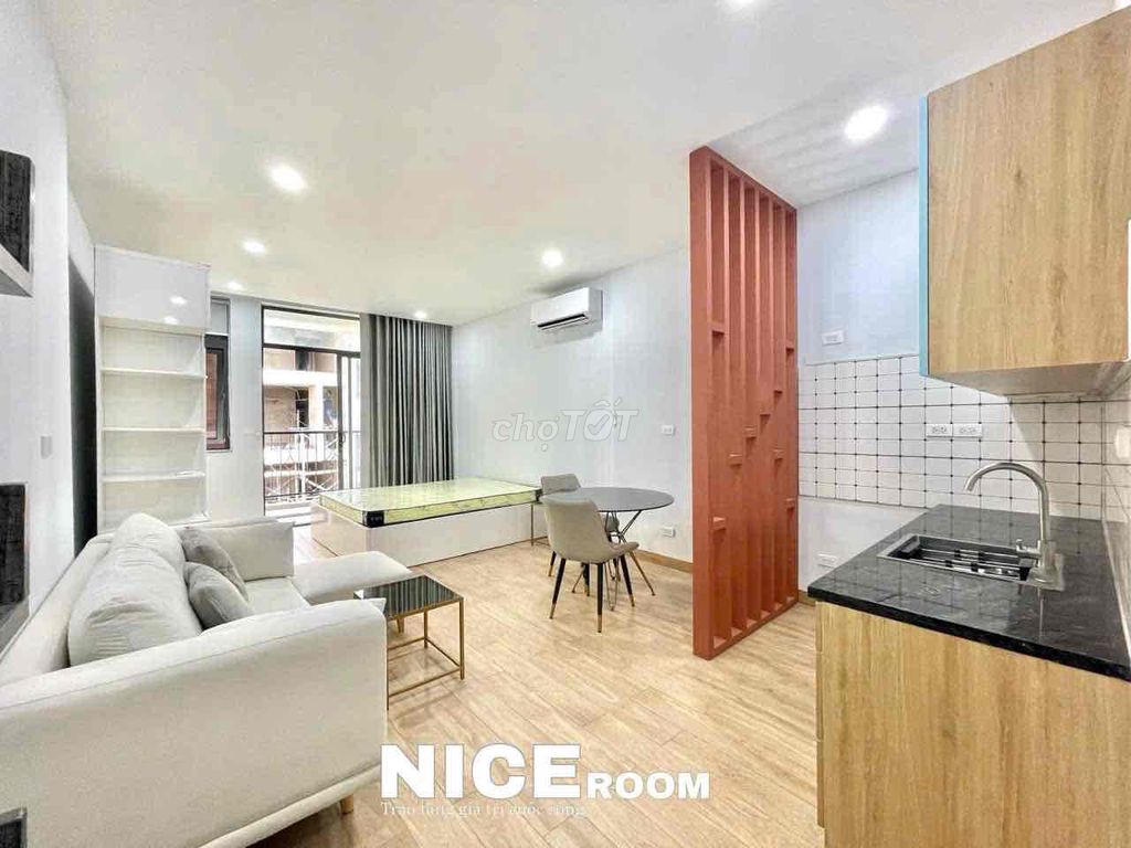 The apartment is full of furniture at the staff academy.