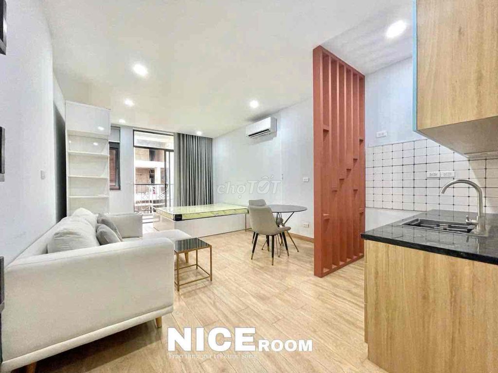 The apartment is full of furniture at the staff academy.