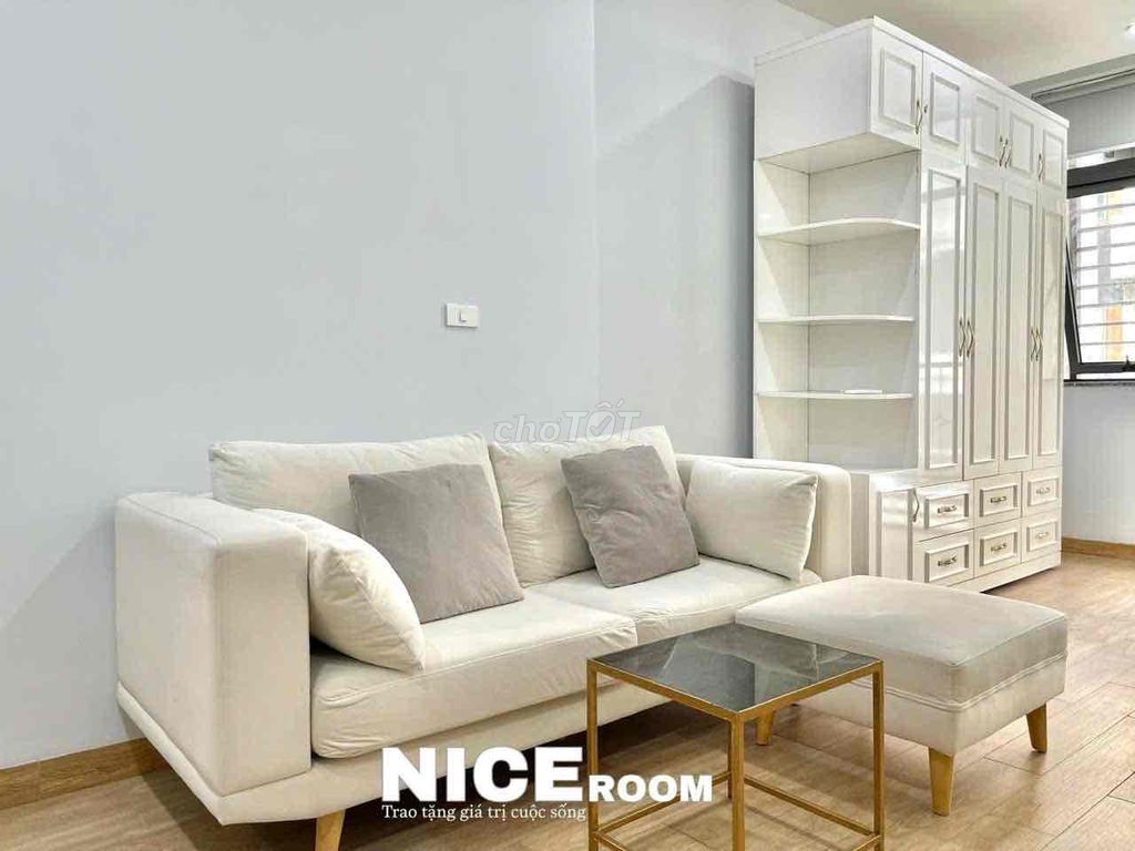 The apartment is full of furniture at the staff academy.