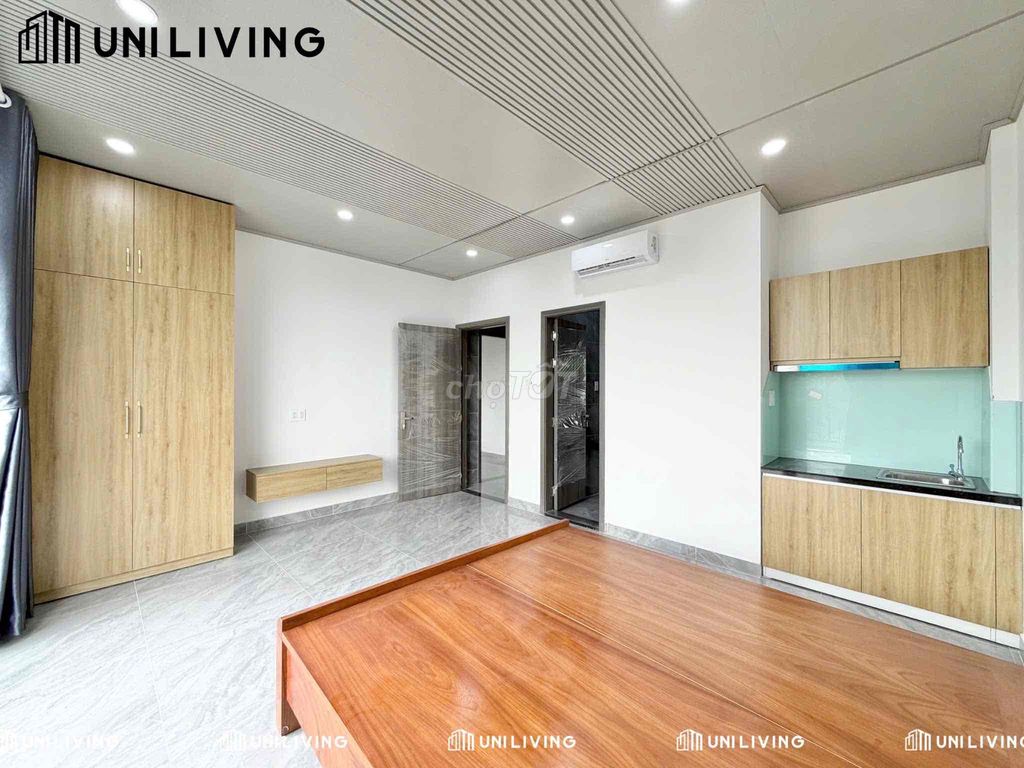 Room full interior, large glass balcony, natural light