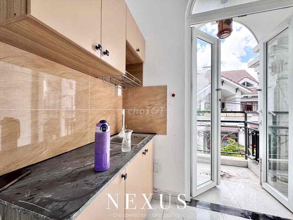 Rent two new balcony bedrooms near Art Phan Huy Ích.