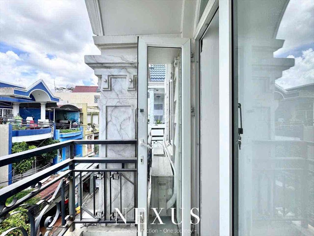 Rent two new balcony bedrooms near Art Phan Huy Ích.