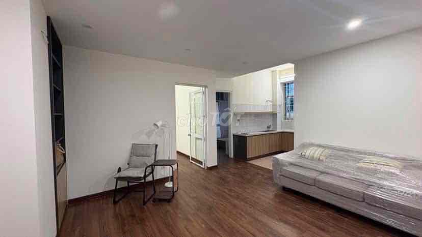 Two bedrooms open windows near the center.