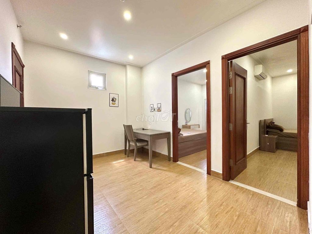 Two bedrooms. Two bathrooms. A living room in the Royal Park.