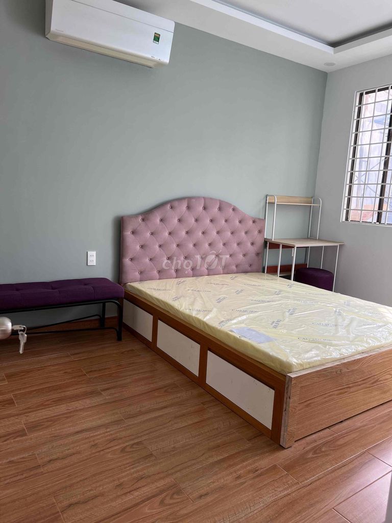 Two-room mini apartments, kitchen-four-year-olds, balconys and open windows.