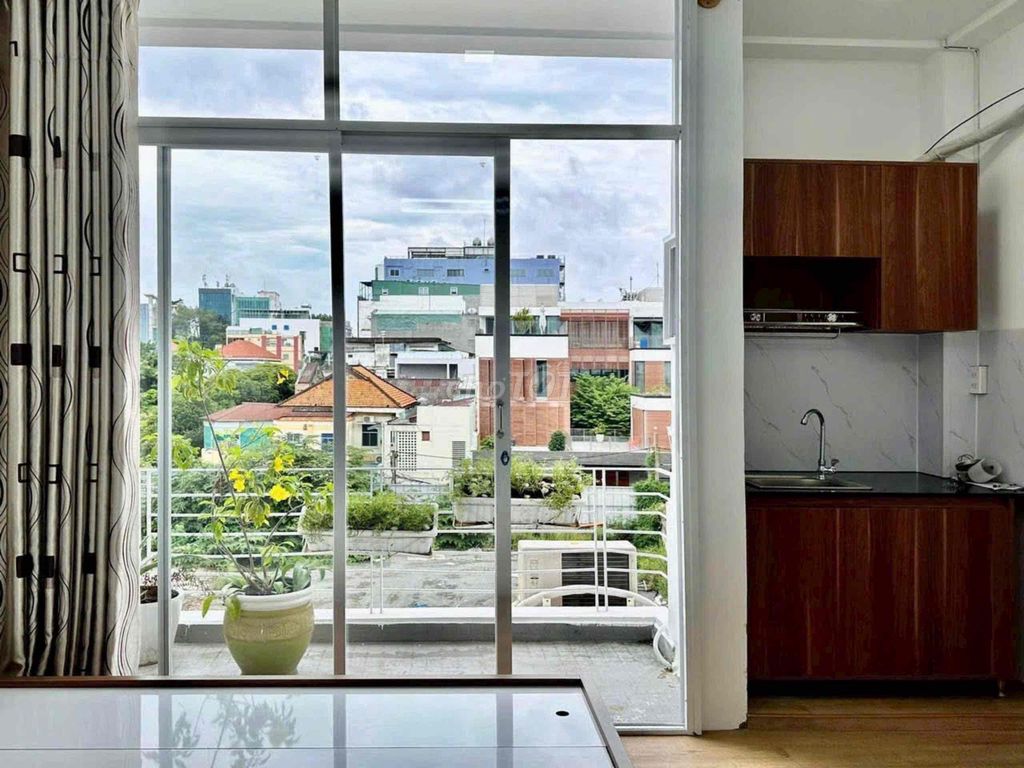 A studio suite full of balconies 10 near the University of Constitution, Lotus