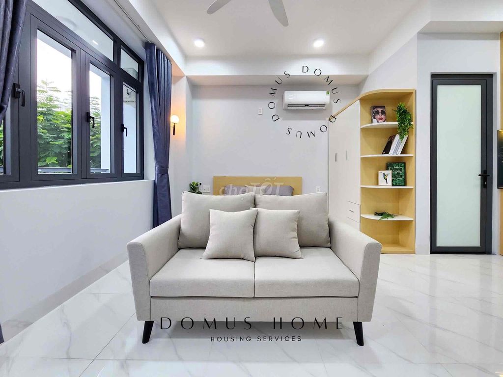 The studio is full of furniture, with a cool balcony in the center of 7th.